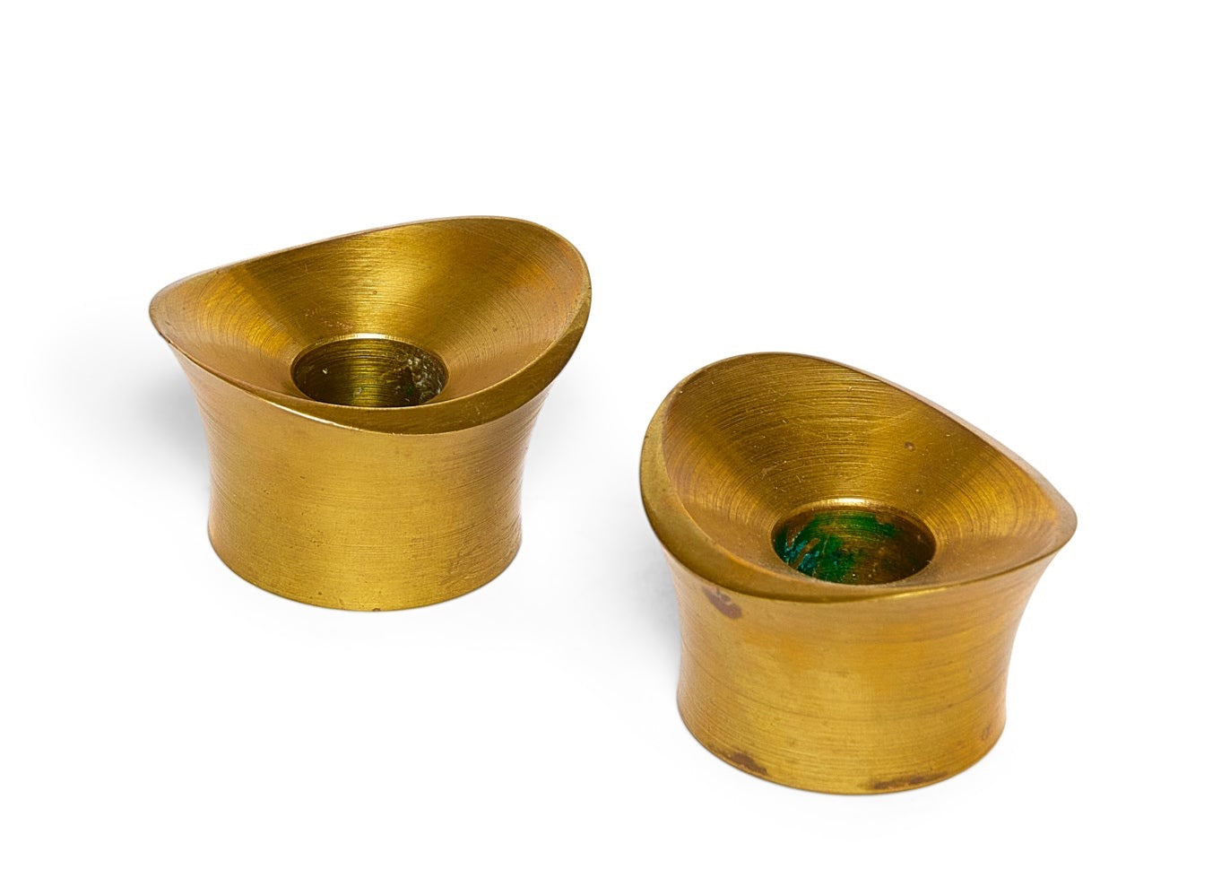 A Hand-Turned Pair of Solid Brass Candleholders by Tapio Wirkkala