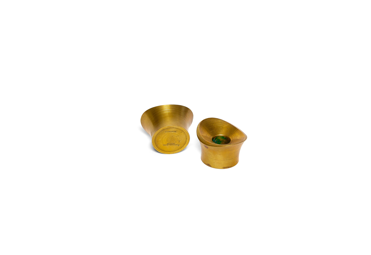A Hand-Turned Pair of Solid Brass Candleholders by Tapio Wirkkala