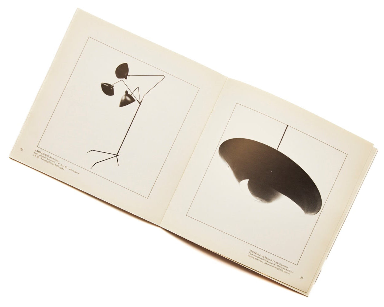 {"loading" => "lazy", "class" => "motion-reduce", "sizes" => "(min-width: 1200px) 267px, (min-width: 990px) calc((100vw - 10rem) / 4), (min-width: 750px) calc((100vw - 10rem) / 3), calc(100vw - 3rem)", "widths" => "165, 360, 535, 750, 940, 1100", "alt" => "Serge Mouille luminaires 1953-1962", "is" => "lazy-image"}