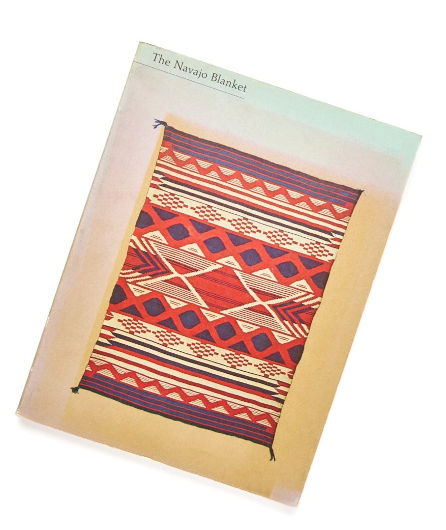 {"loading" => "lazy", "class" => "motion-reduce", "sizes" => "(min-width: 1200px) 267px, (min-width: 990px) calc((100vw - 10rem) / 4), (min-width: 750px) calc((100vw - 10rem) / 3), calc(100vw - 3rem)", "widths" => "165, 360, 535, 750, 940, 1100", "alt" => "The Navajo Blanket", "is" => "lazy-image"}