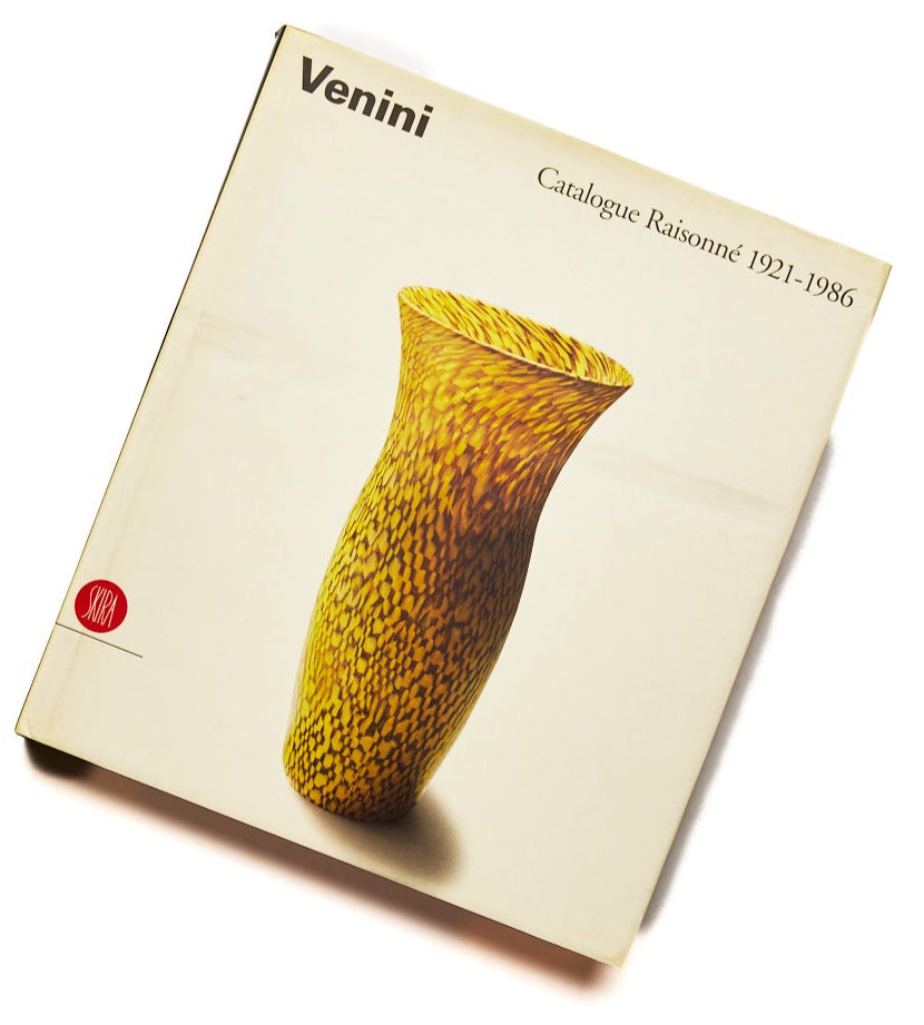 {"loading" => "lazy", "class" => "motion-reduce", "sizes" => "(min-width: 1200px) 267px, (min-width: 990px) calc((100vw - 10rem) / 4), (min-width: 750px) calc((100vw - 10rem) / 3), calc(100vw - 3rem)", "widths" => "165, 360, 535, 750, 940, 1100", "alt" => "Venini Catalogue Raisonné 1921-1986", "is" => "lazy-image"}